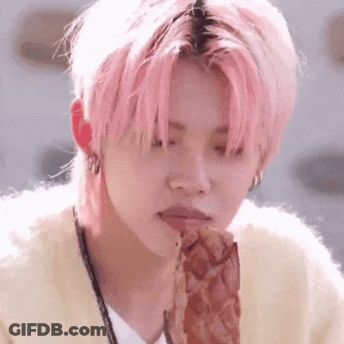 Person With Pink Hair Eating Meat GIF