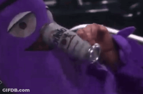 Person With Purple Mask Holding Soda GIF