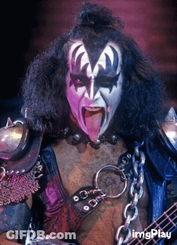 Person With Purple Paint On Face Tongue Out GIF