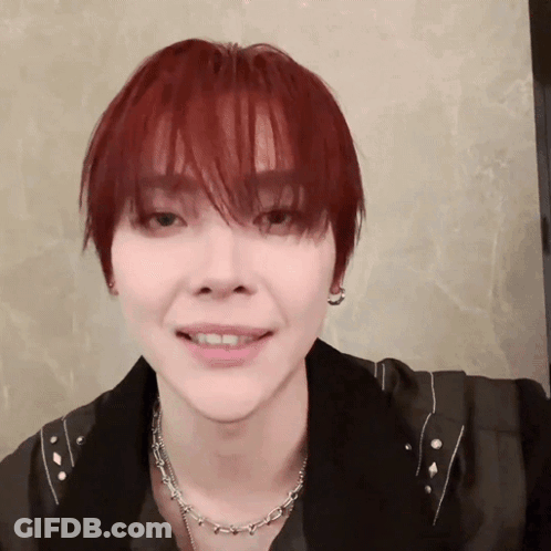 Person With Red Hair And Necklace GIF