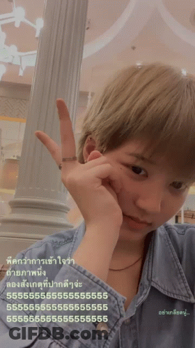 Person With Ring Making Peace Sign GIF