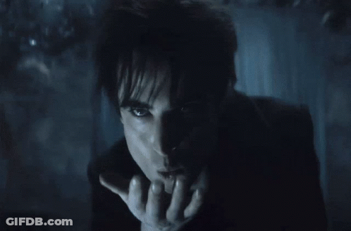 Person With Smoke Coming Out Of Mouth GIF