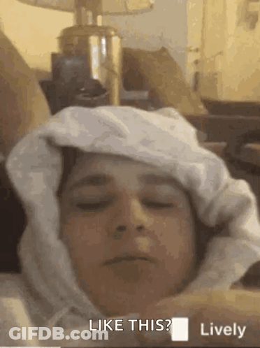 Person With White Blanket On Head Says Like This GIF