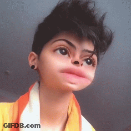 Person With Yellow Scarf Making Funny Face GIF