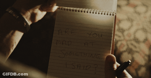 Person Writing In Notebook Saying Are You Mad At Something I Said GIF