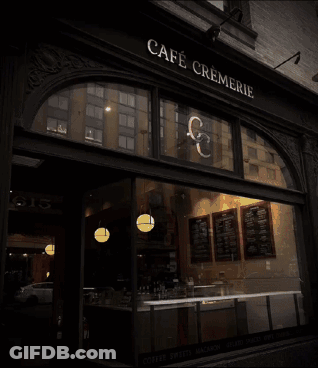 Person Writing On Paper With Coffee And Typewriter GIF