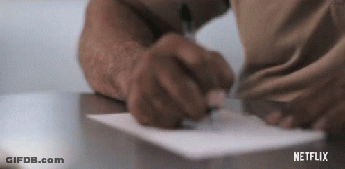 Person Writing On Paper With Pen GIF