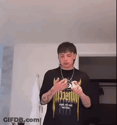 Peso Pluma Dancing While Applying Cream GIF