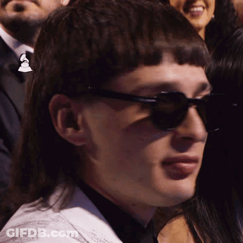 Peso Pluma Looking At Camera Smiling GIF