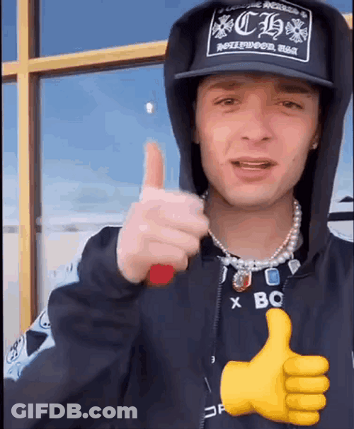 Peso Pluma On Hoodie With Thumbs Up Emoji GIF