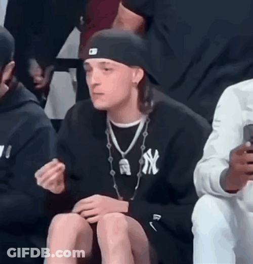 Peso Pluma Sitting Courtside GIF
