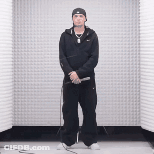 Peso Pluma Standing Within Crowd GIF