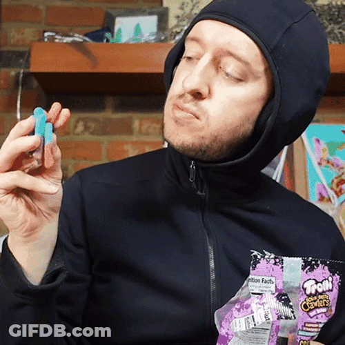 Peter Deligdisch Eating Worm Gummies GIF