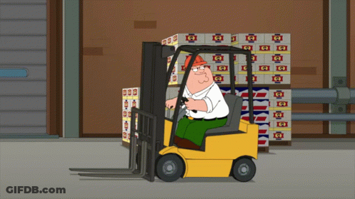 Peter Griffin Driving Forklift Past Boxes With Letter Q GIF