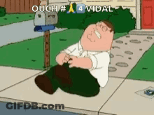 Peter Griffin From Family Guy Is Laying On The Sidewalk In Front Of A Mailbox GIF