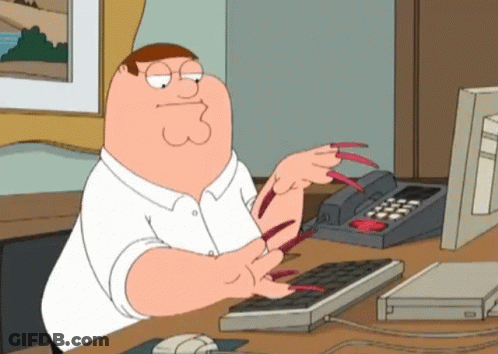Peter Griffin From Family Guy Is Sitting At A Desk Typing On A Keyboard GIF