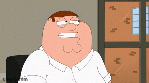 Peter Griffin Sitting By Brick Building GIF