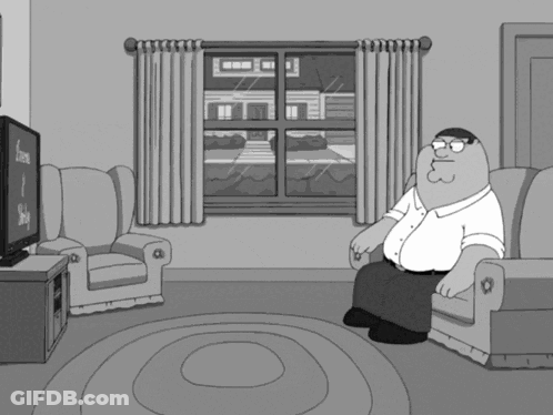 Peter Griffin Sitting On Couch Watching TV GIF