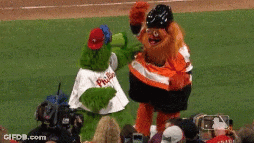 Phanatic Green And Orange Mascots Dance Showdown GIF