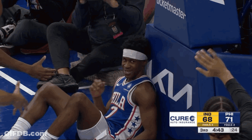 Philadelphia 76Ers Player Sitting On Bench GIF