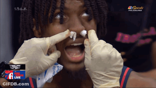 Philadelphia Basketball Player Getting Nose Cleaned GIF