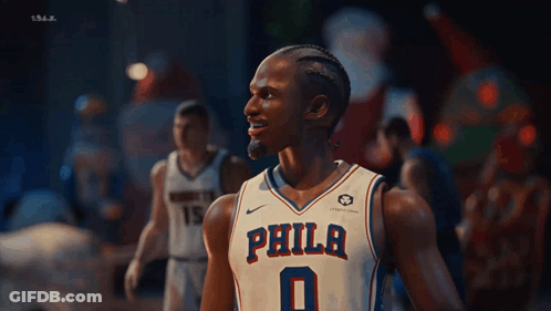 Philadelphia Basketball Player In Front Of Santa GIF