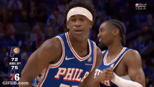 Philadelphia Basketball Player Standing In Front Of Another GIF
