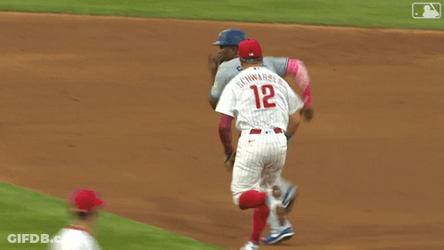 Phillies Baseball Player Laying On Ground With Another Player GIF