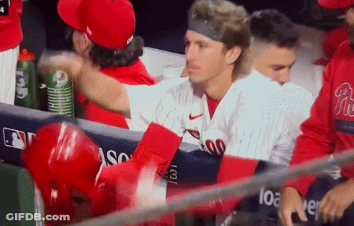 Phillies Jersey Man Talking To Another GIF