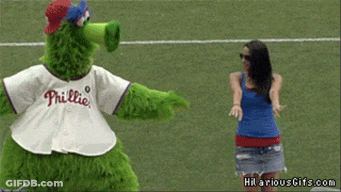 Phillies Mascot And Woman With Arms Outstretched GIF