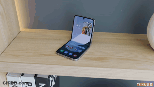 Phone On Wooden Shelf Saying Thinkjules GIF