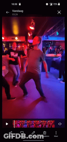 Phone Screen Showing Man Dancing In Club GIF