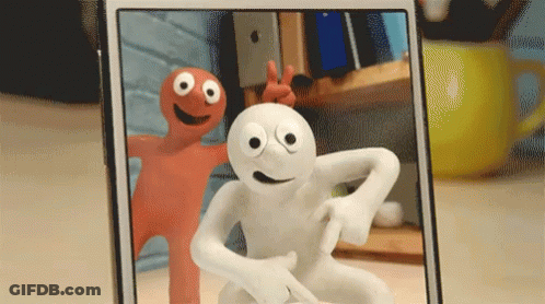 Phone With Two Cartoon Characters One Big Eyes GIF