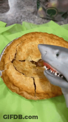 Pie With Bite And Toy Shark GIF