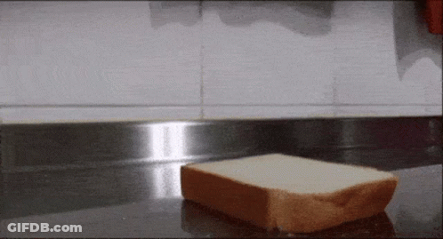 Piece Of Bread On Counter GIF