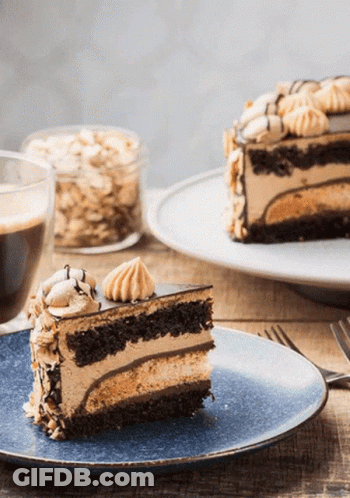 Piece Of Cake And Coffee On Blue Plate GIF