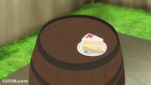 Piece Of Cake On A Plate On Barrel GIF
