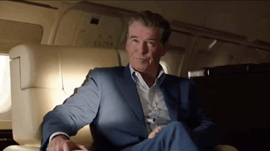Pierce Brosnan Looks Of Intrigued GIF