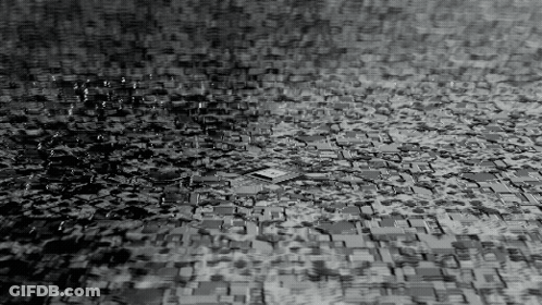Pile Of Black And White Puzzle Pieces GIF