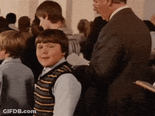 Pile Of Gummy Bears With Toothbrush GIF