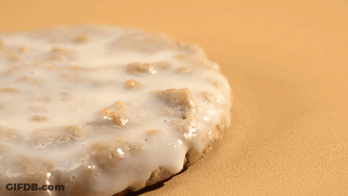 Pile Of Oats Next To Donut GIF