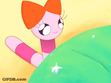 Pink And Orange Cartoon Lying On Green GIF