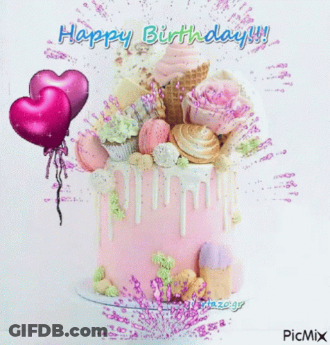Pink And White Birthday Cake With Balloons And Flowers GIF