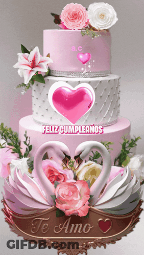 Pink And White Cake With Two Swans Saying Te Amo GIF