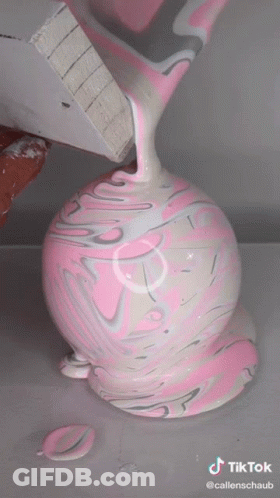 Pink And White Marbled Vase With TikTok Watermark GIF