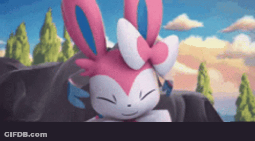 Pink Bunny With Bow Standing On Rock GIF