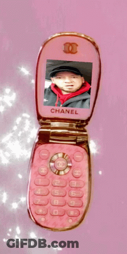 Pink Chanel Flip Phone On Pink Background GIF