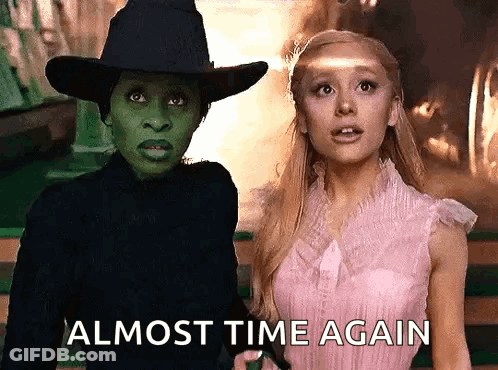Pink Dress Woman And Black Hat Witch GIF