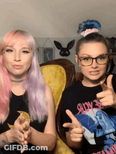 Pink-Haired Girl Thumbs Up Next To Glasses Girl GIF