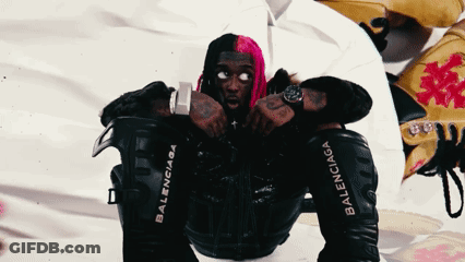 Pink-Haired Man In Black Jacket With Balenciaga Sleeves GIF